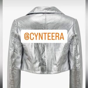 Stunningg silver 100% leather bolero jacket. Great for holidays.